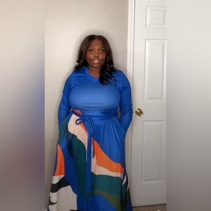 Long sleeve blue multicolor long flowy dress.